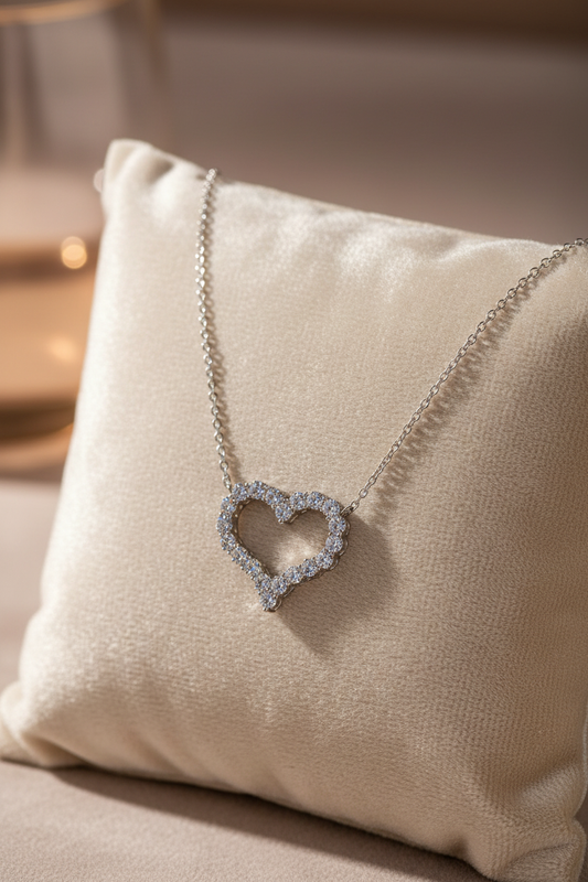 Crystal heart necklace on cushion