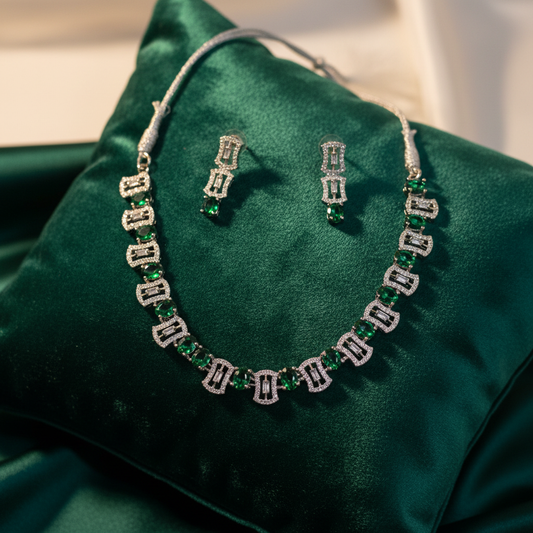 Emerald set on velvet cushion