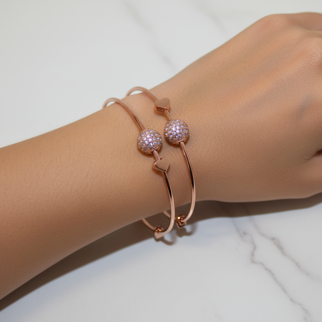 Model wearing rose gold bracelet set - close-up