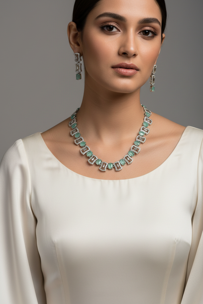 Model wearing mint green jewellery set - close-up