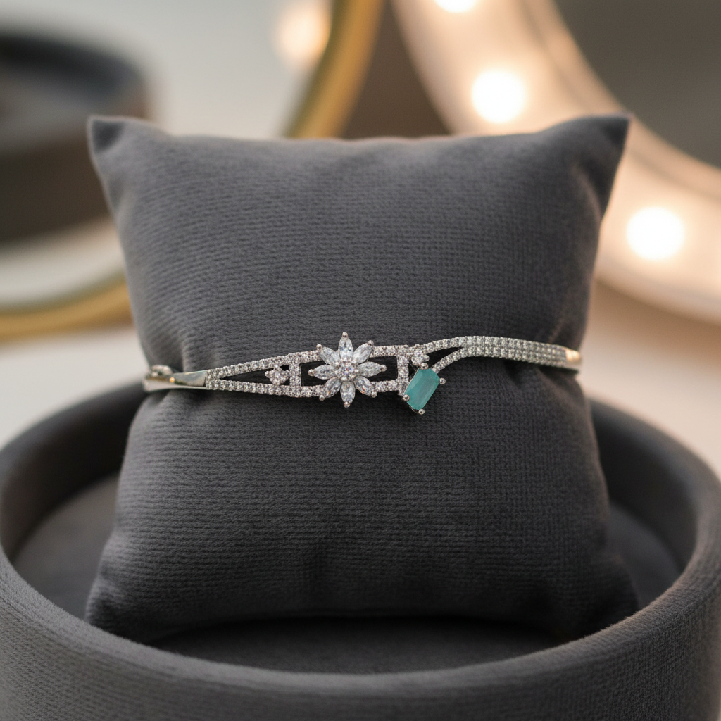 Crystal and turquoise bangle bracelet on velvet cushion