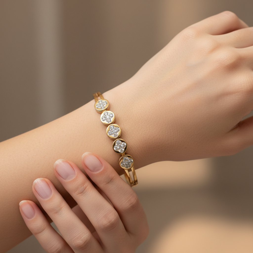 Model wearing gold crystal circle bangle bracelet - close-up