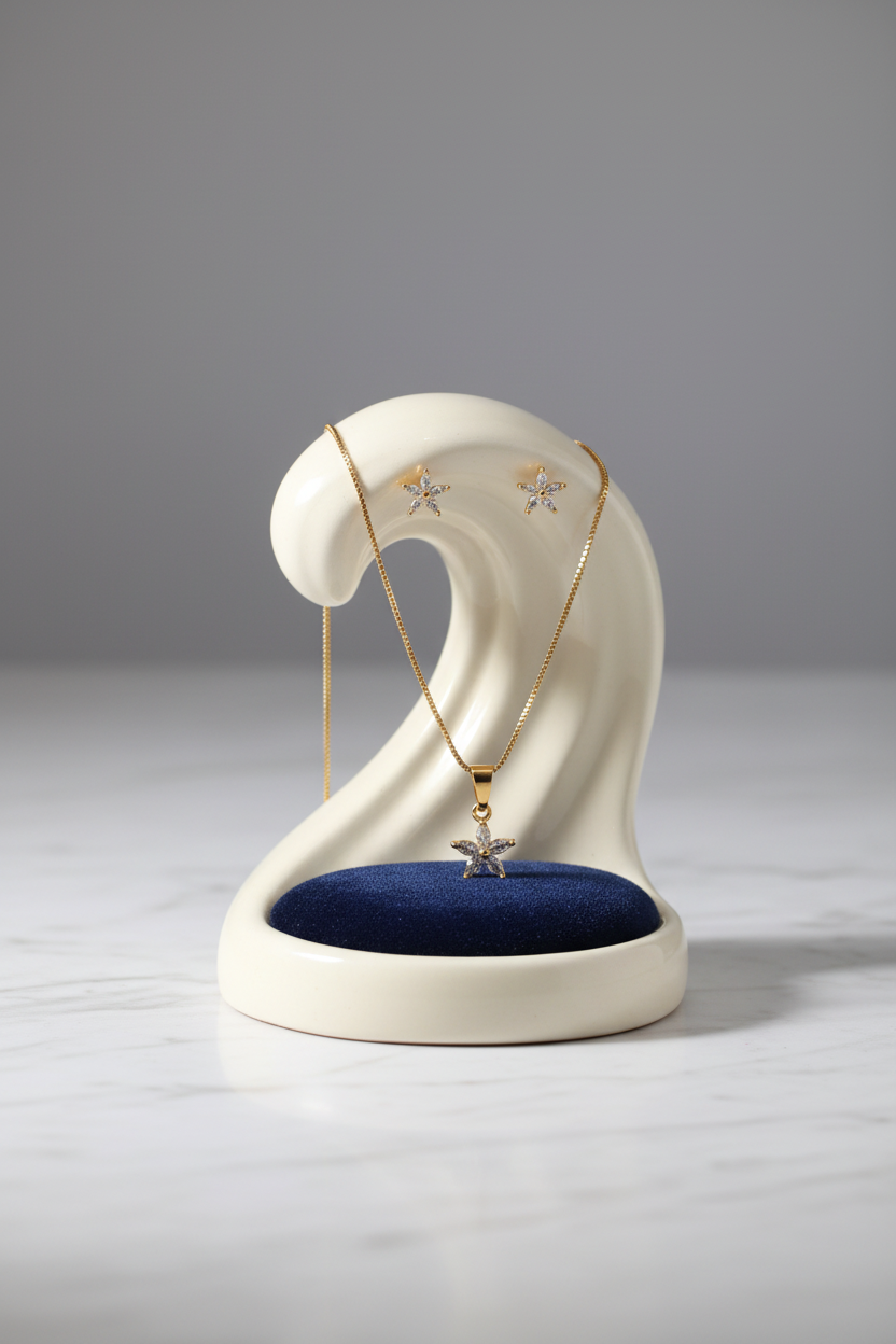 Gold starfish jewellery set on display stand