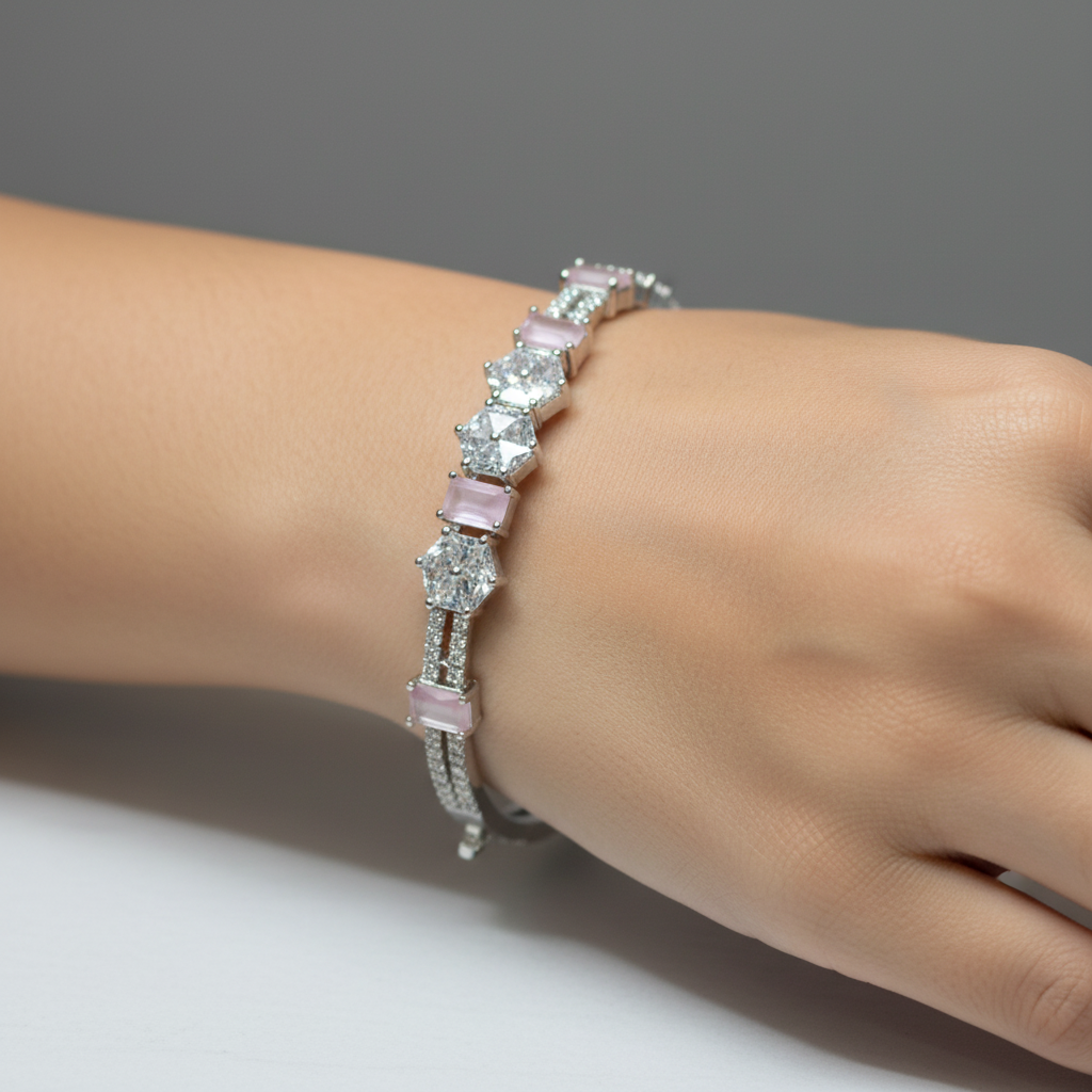 Model wearing pink gemstone bangle bracelet - close-up
